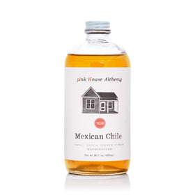Pink House Alchemy Mexican Chile Simple Syrup bottle ready to flavor cocktails with smoky, sweet heat