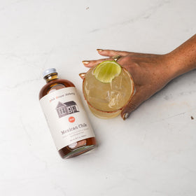 Lemonade with Pink House Alchemy Mexican Chile Simple Syrup for a smoky sweetness