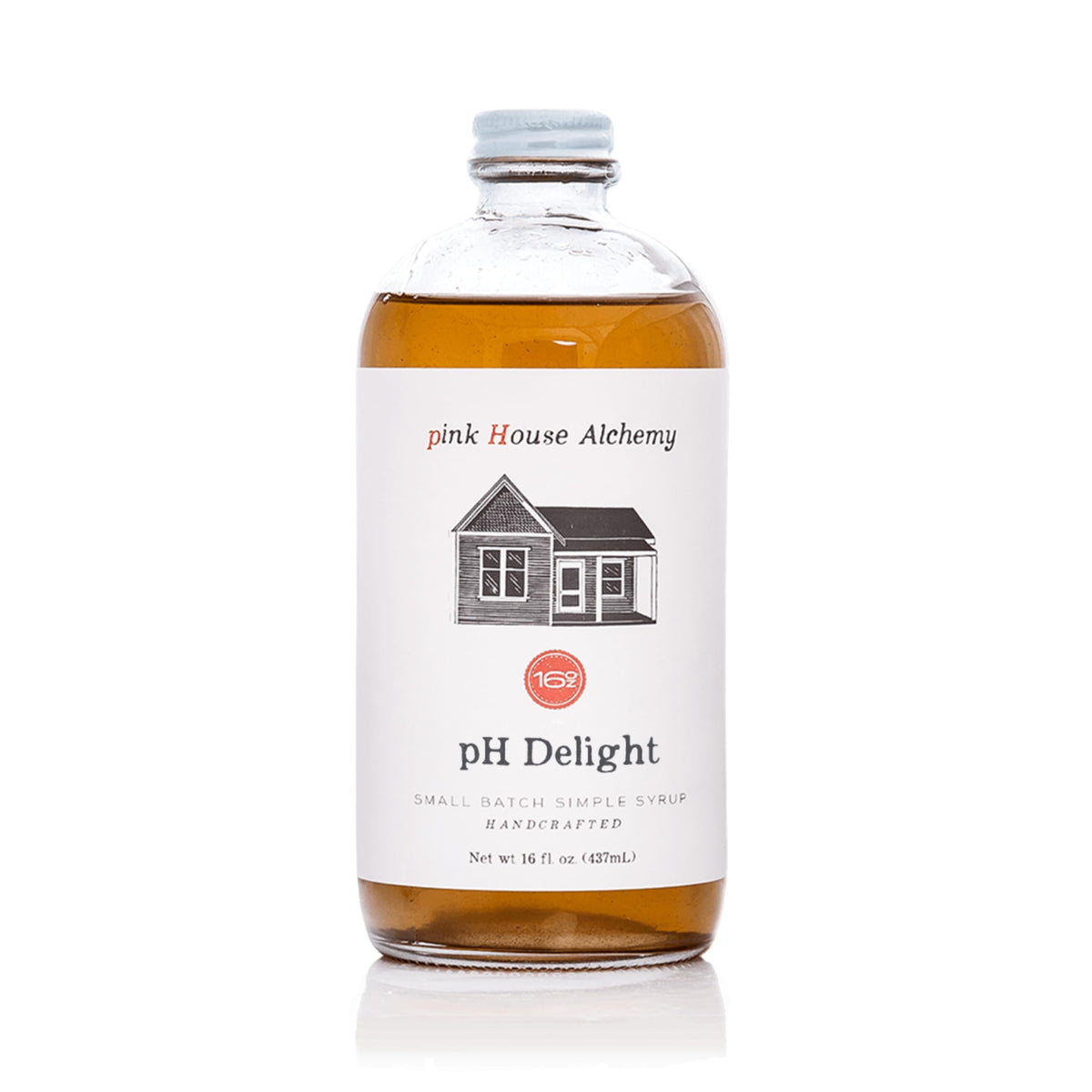 Pink House Alchemy PH Delight bottle pour enhances beverages with vanilla, cinnamon, and honey notes