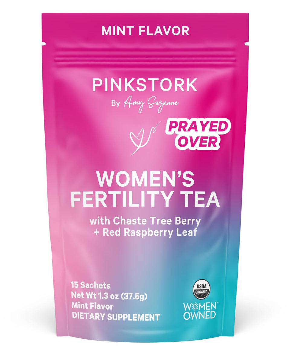 Pink Stork Organic Fertility Tea sachets in packaging, inviting a calm preconception ritual