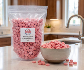 Emporium Candy Pink Wintergreen Mints discs—smooth melt-in-your-mouth texture