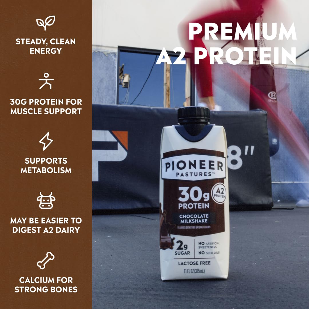 Pioneer Pastures A2 milkshake chocolate at office desk for a quick protein boost