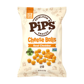 Close-up of Pip's Heirloom Cheddar Balls showing cheddar and crisp texture.