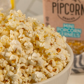 Pipcorn Heirloom mini popcorn kernels in a bowl, gluten-free and vegan crunch.