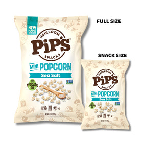 Hand holding mini Pip's popcorn indicates bite-size crunch.