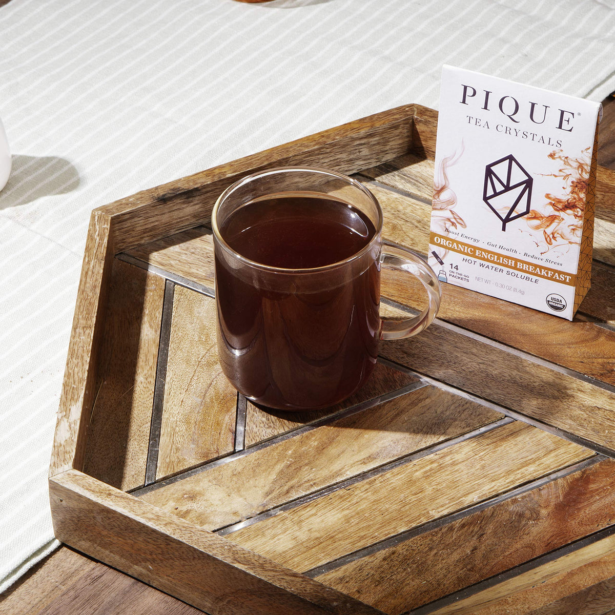 PIQUE Organic black tea leaves closeup highlighting premium sourcing