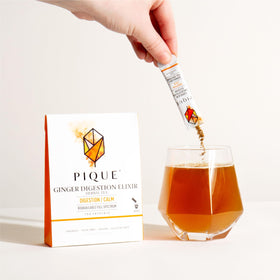 Visible organic ginger and citrus peels for caffeine-free soothing effects.