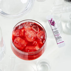 PIQUE Hibiscus Tea Crystals served iced for a vibrant, skin-friendly refreshment