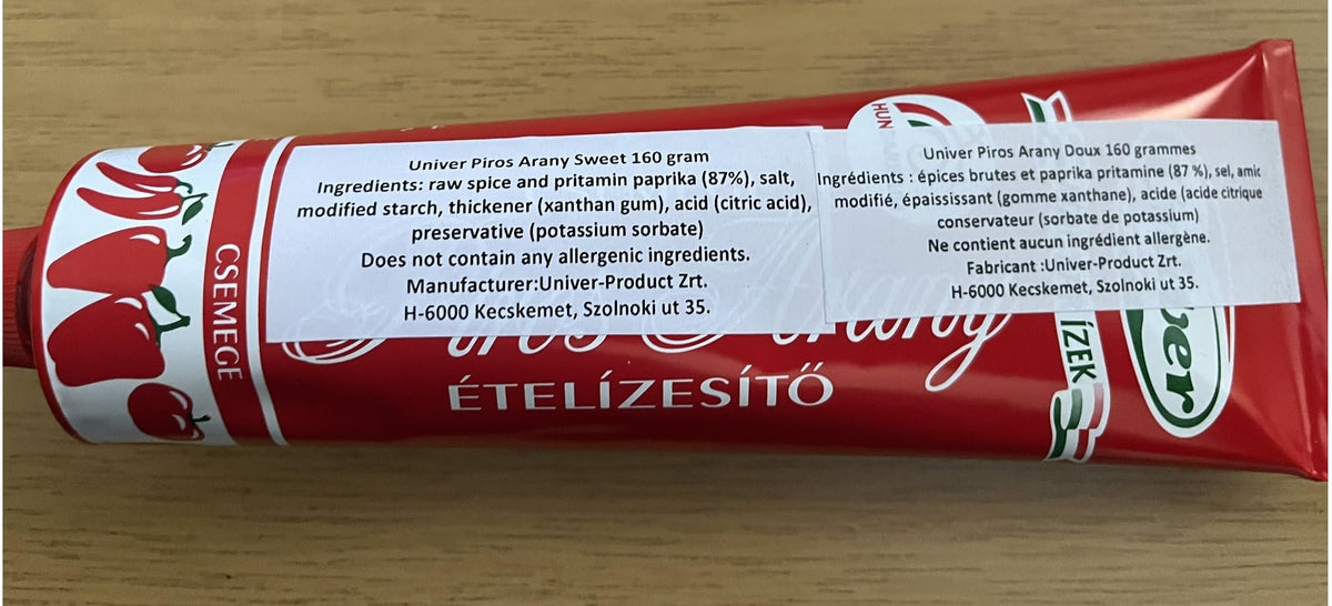Piros Arany Univer paprika paste bottle mild sweet flavor ideal for meals.
