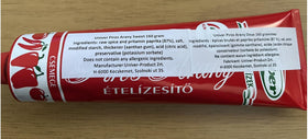 Piros Arany Univer paprika paste bottle mild sweet flavor ideal for meals.