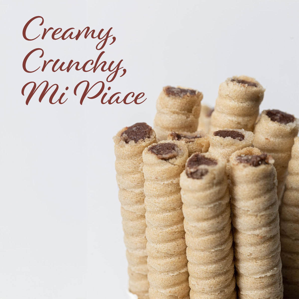 Pirucream wafers beside coffee, perfect snack moment
