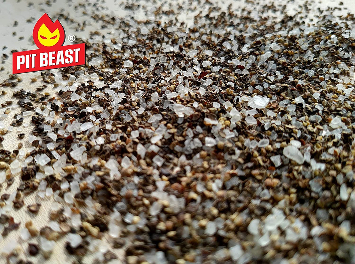Pit Beast grilled chicken seasoned with coarse salt and pepper rub.