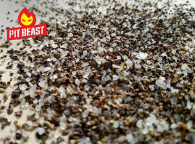 Pit Beast grilled chicken seasoned with coarse salt and pepper rub.