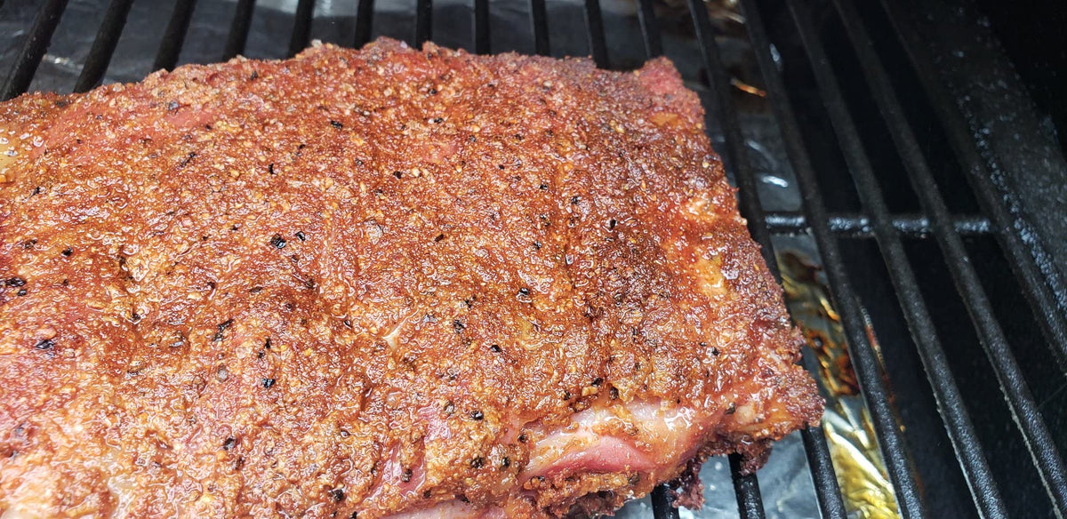 Pit Beast New England BBQ Rub pork ribs shot with smoky, mouthwatering coating