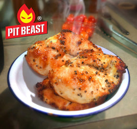 Pit Beast salmon with spice adds bold flavor to seafood.