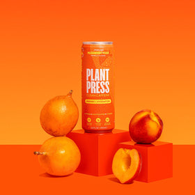 12-pack display of Plant Press Passionfruit Peach ready for sharing or events