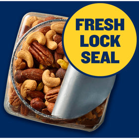 Close up of Planters Deluxe Mixed Nuts with Sea Salt showing the roasted nut mix and crisp texture.