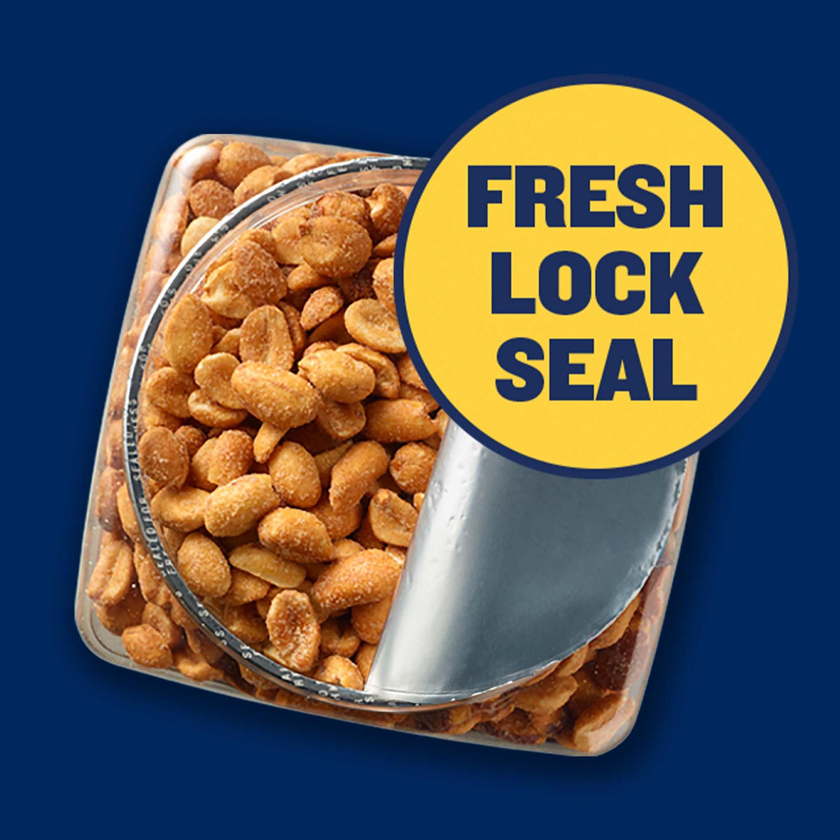 Planters dry roasted peanuts in a bowl, inviting nutty aroma.