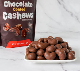 Kosher-certified Platinum Chocolate Coated Cashews label signals quality.