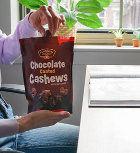 Roasted cashews under a smooth milk chocolate shell reveal texture and crunch.