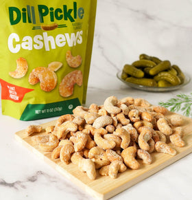 Platinum Dill Pickle Cashews pouch-open for on-the-go freshness.
