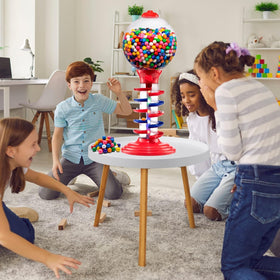 Playo pink gumball dispenser in a festive party setting