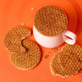 Podium Protein Stroopwafel packaging front highlights a gym-friendly, larger-than-average treat.