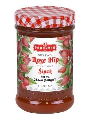 Podravka Rose Hip Jam jar on a clean surface, ideal pantry staple for breakfast.