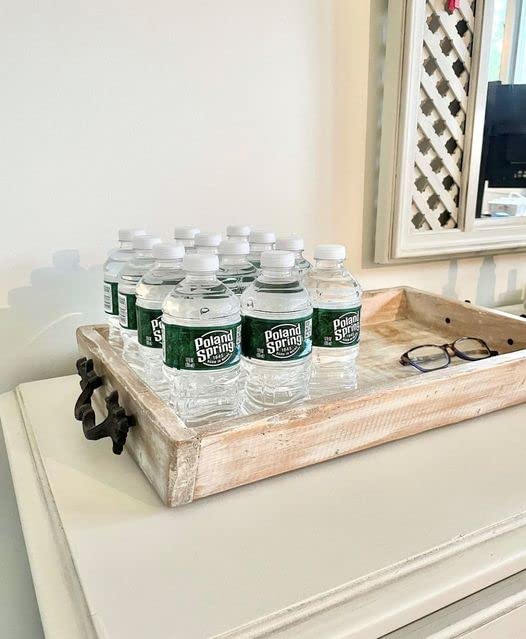 Poland Spring 8oz mini-bottle used in a family setting