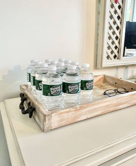 Poland Spring 8oz mini-bottle used in a family setting