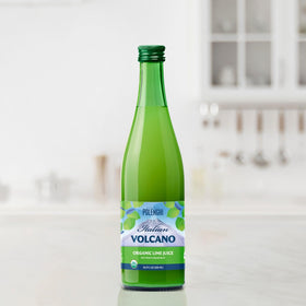 Polengi Organic Lime Juice glass close-up emphasizing natural, preservative-free quality.