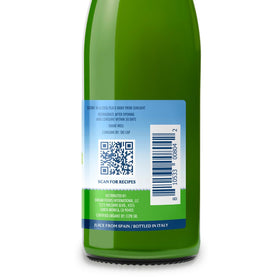 Polengi lime juice bottle on countertop showcasing convenient glass packaging.