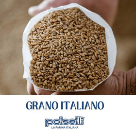 Hand rolling POLSELLI 00 dough for pizza crust with fine texture.