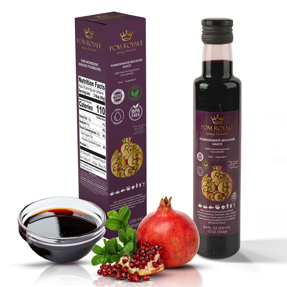 Pom Royale pomegranate molasses bottle glistening; perfect glaze for meats and roasted vegetables.