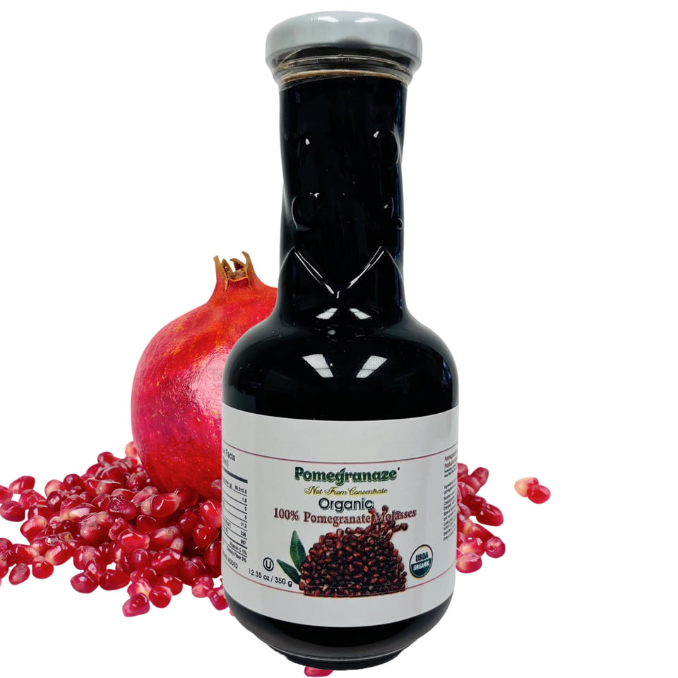 Pomegranaze organic pomegranate molasses in glass bottle, rich flavor for dressings and glazes.