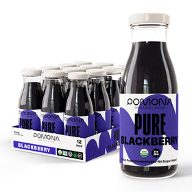 Pomona Organic Blackberry Juice bottle in glass, ready for on-the-go sipping