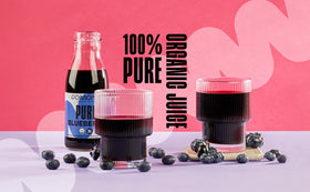 Pomona Organic Juices blueberry juice pour into a glass for a ready-to-drink experience.