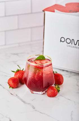 Pomona Strawberry Juice on-the-go bottle demonstrating pure, single-ingredient fruit simplicity