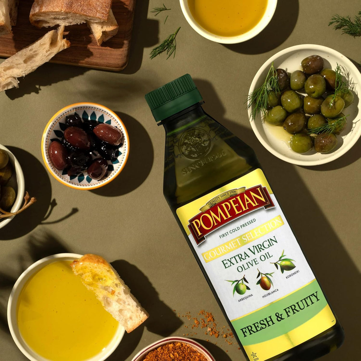 Unopened Pompeian Gourmet EVOO bottle on a kitchen shelf for everyday use.