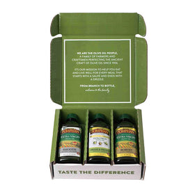 Pompeian three-bottle set on counter shows versatile EVOOs