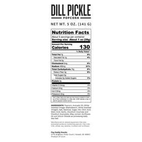 POP DADDY Dill Pickle popcorn displayed in kitchen for artisanal quality.