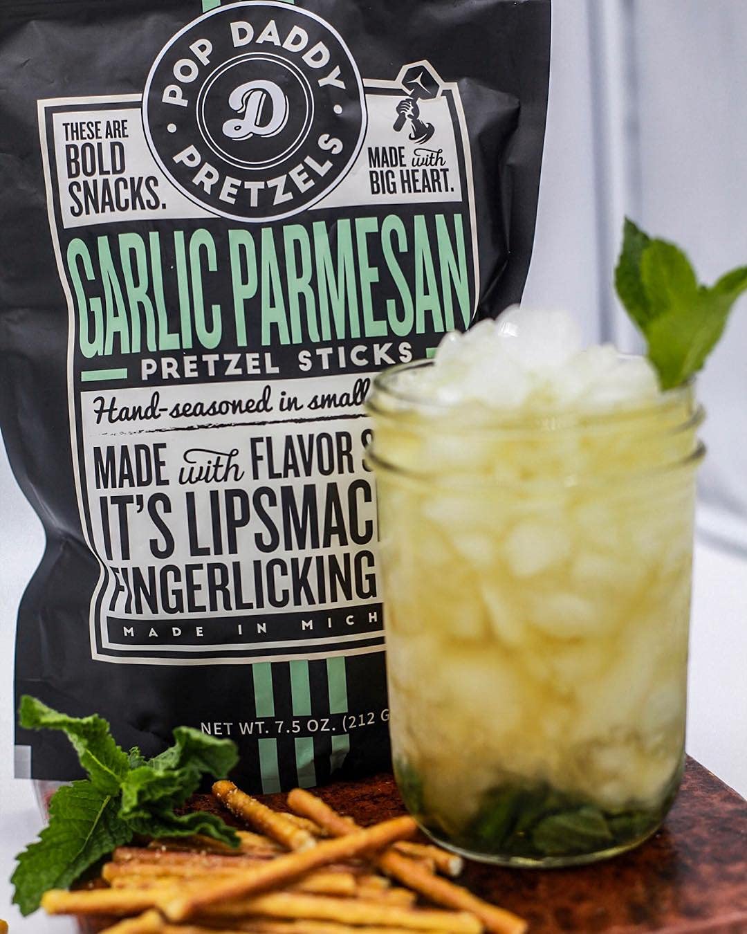 Gourmet snack packaging for Pop Daddy Garlic Parmesan pretzels.