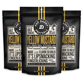 Pop Daddy Yellow Mustard pretzel sticks in packaging for easy, on-the-go snacking.