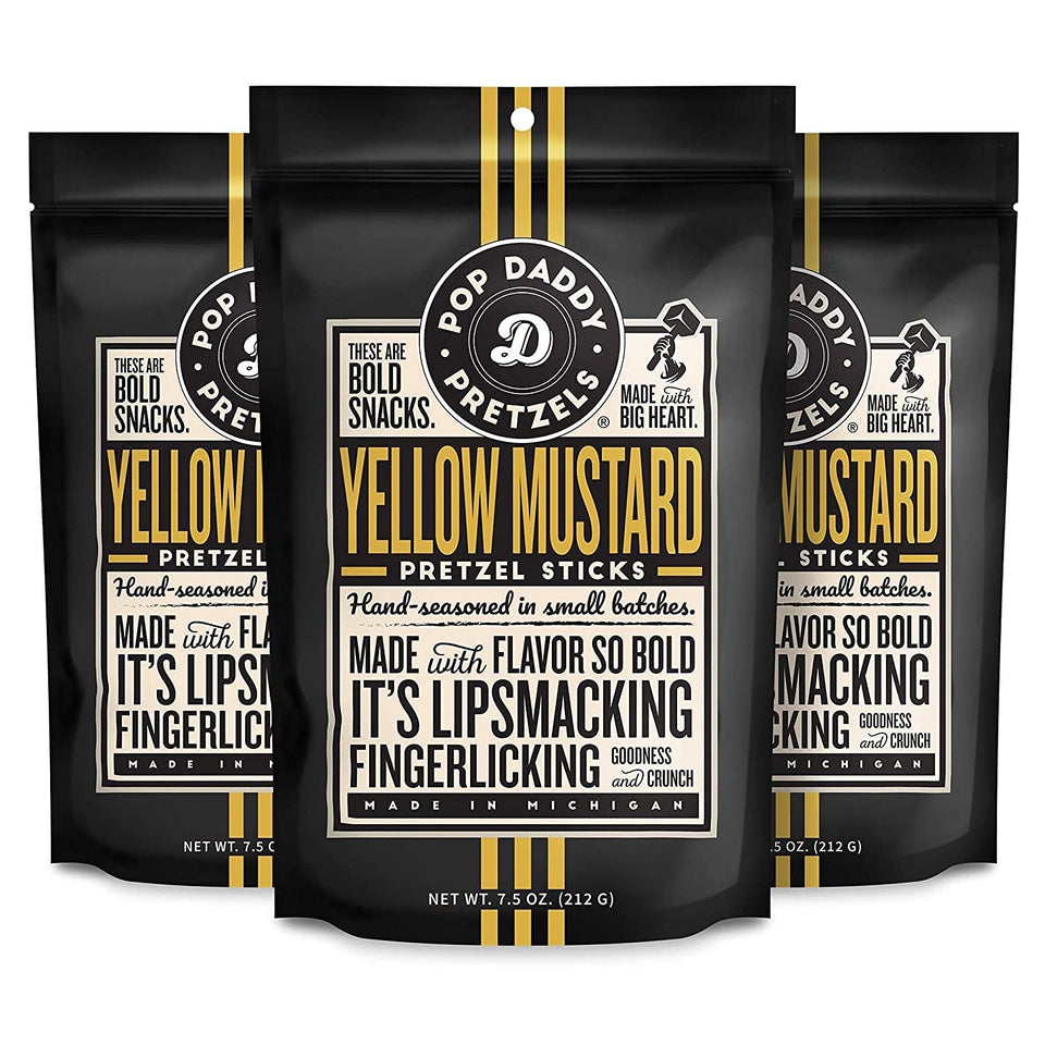 Pop Daddy Yellow Mustard pretzel sticks in packaging for easy, on-the-go snacking.