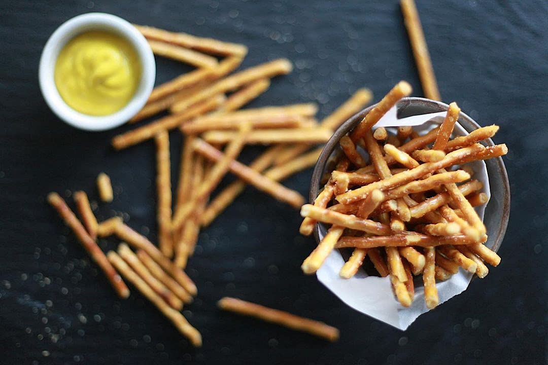 Pop Daddy Yellow Mustard pretzels close-up shows bold flavor and crispy texture.