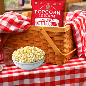 Popcorn Indiana Kettle Corn king-size caddy with six bags, ideal for stockpiling snacks.