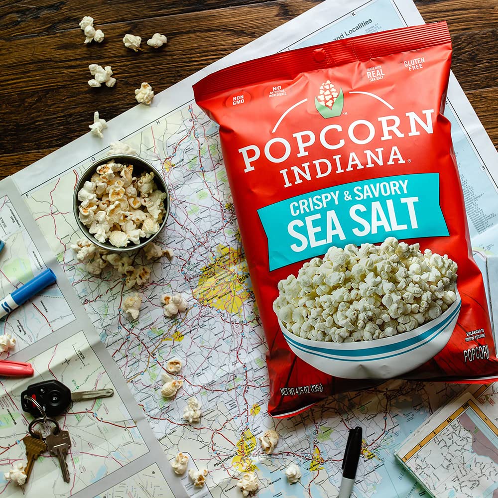 Pack of Popcorn Indiana Sea Salt Popcorn bags offers convenient single-serve snacking.