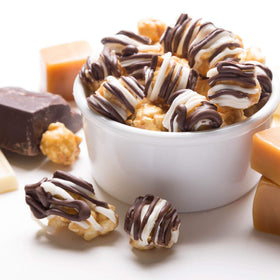 Popcornopolis Zebra caramel-striped popcorn highlights rich sweetness and cocoa accents.
