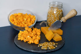 PopN Popcorn cheddar cheese snack on table, ready for family movie night or picnic