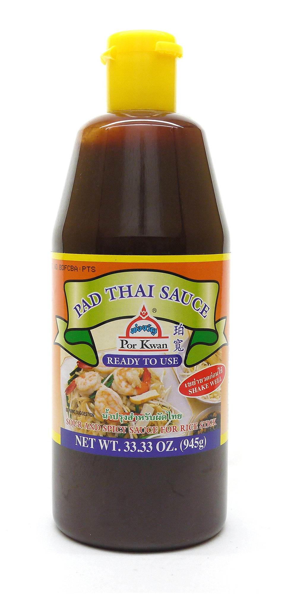 Por Kwan Pad Thai sauce bottle boosts authentic flavor for quick weeknight meals.
